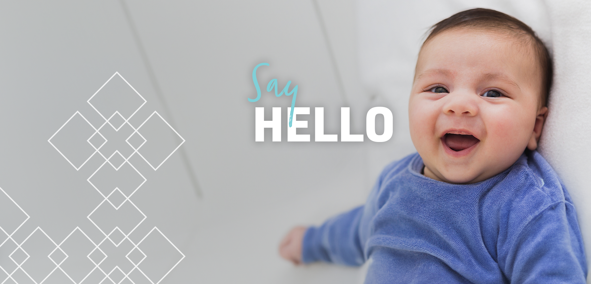 Baby smiling with text "say hello"