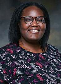 Stacy Ogbeide's headshot photo.