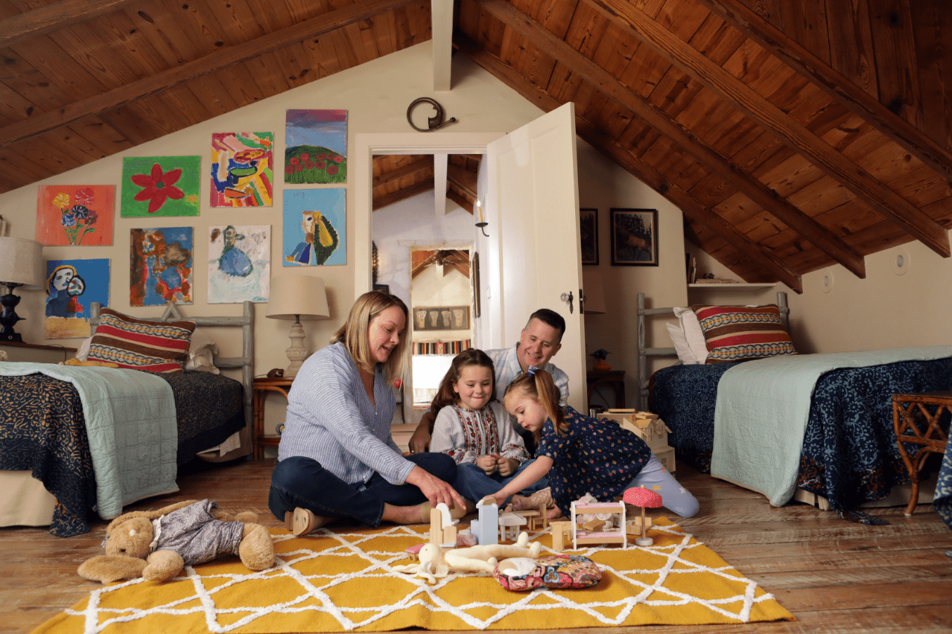 A family playing in kids room