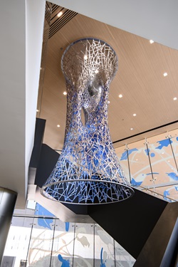 NEST by Michael Szivos hangs in the lobby of the new Women’s and Children’s Hospital on the University Health Medical Center Campus.