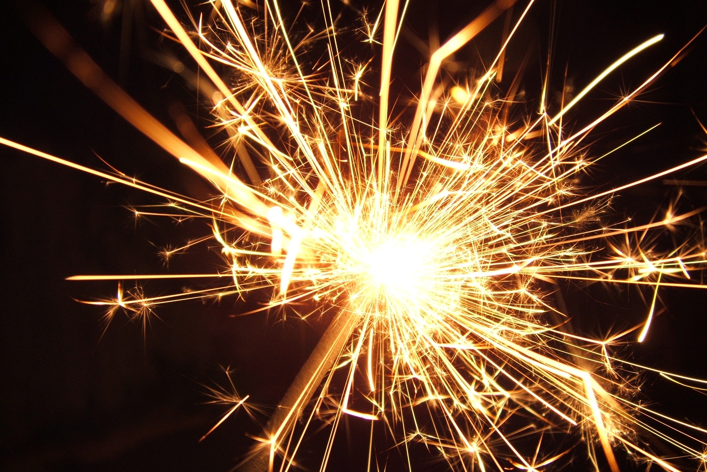 An up close view of a sparkler at night