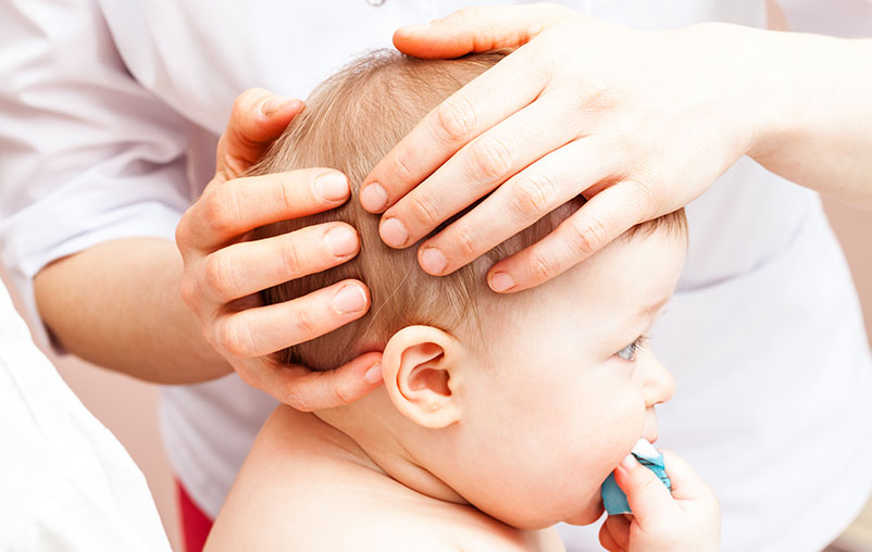 a doctor writes diagnosis of TIA